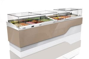 A modern refrigerated display case with glass covers, showcasing an assortment of colorful pastries and desserts arranged neatly in rows. The case has a sleek beige and silver design.