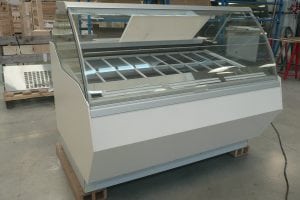A freezer with glass top.