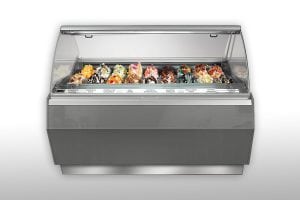A display freezer filled with various colorful gelato flavors, each labeled, with clear glass at the front and a sleek gray exterior.