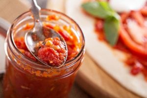 Pizza sauce in a jar selective focus
