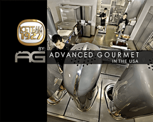 A modern kitchen with large silver ice cream machines, chefs working, and a banner reading ICETEAM 1927 by Advanced Gourmet in the USA.