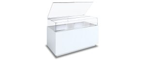 A white commercial chest freezer with a glass lid, partially open, showing the empty interior and metal dividers inside.