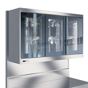 A modern, stainless steel wall-mounted cabinet with sliding glass doors, displaying metal canisters and glass shelves inside.