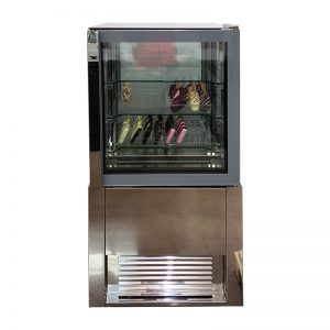 A glass display case with stainless steel base, containing assorted pastries or desserts arranged on two shelves inside.