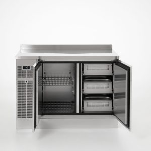 A stainless steel commercial refrigerator with both doors open, revealing wire shelves on the left and three metal drawers on the right. The exterior is sleek with a vent panel on the left side.