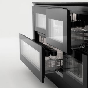 A close-up view of a sleek, modern black refrigerator or freezer unit with two glass-front drawers partially open, revealing organized glass containers inside. The background is plain and white.
